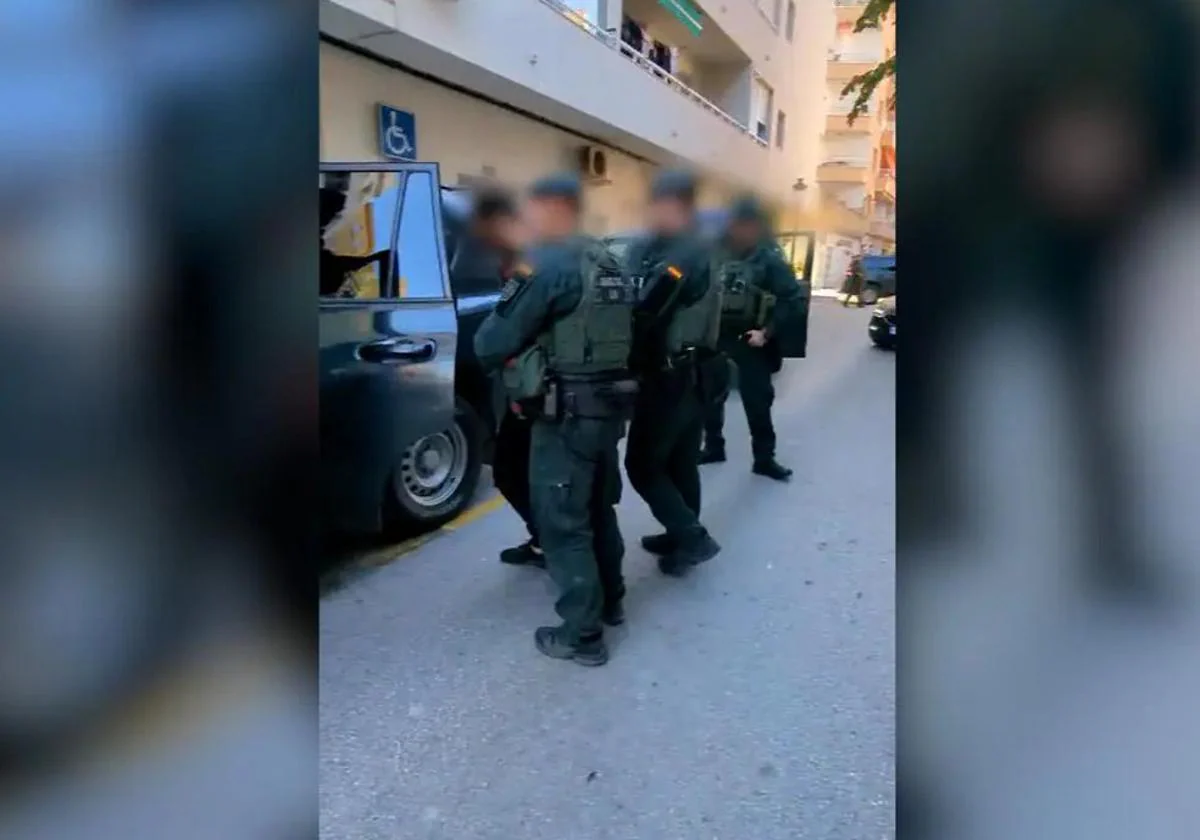 Watch as anti-terror police arrest two alleged jihadists on the Costa del Sol for distributing bomb making and suicide attack manuals