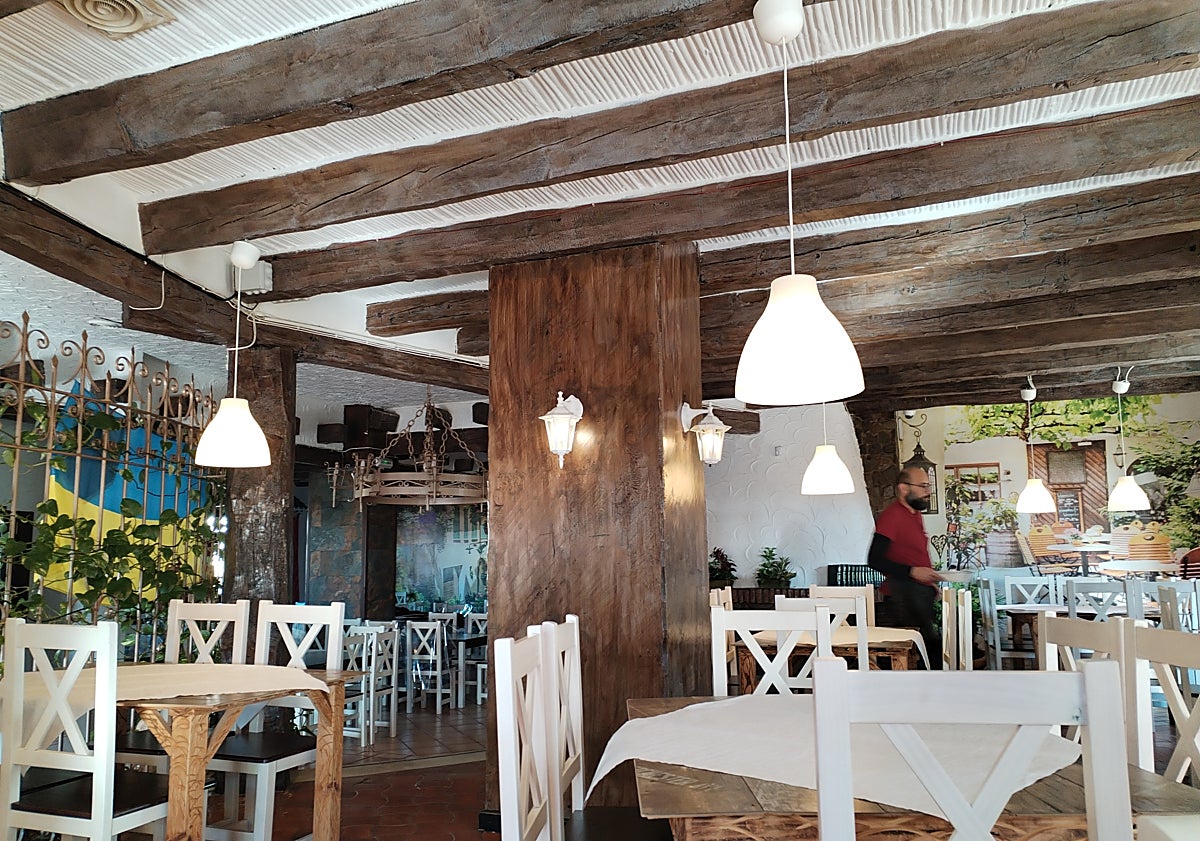 Imagen principal - Interior of the pizzeria. 