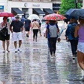 What is the weather forecast for Malaga province during the long holiday weekend?