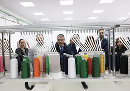 Officials visiting the factory at the official opening.