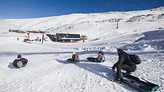Snow on starter slopes sees skiers head to the Sierra Nevada in Granada
