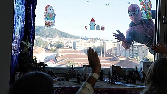 Spider-Man drops in on young patients during Christmas visit to Malaga hospital