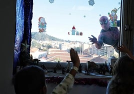 Spider-Man waving to children on one of the wards.