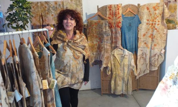 Designer Jolanda van den Broek with a collection of her latest eco printed clothing. 