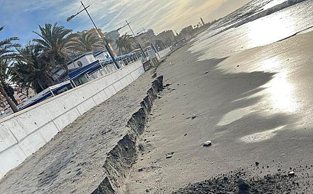 Erosion caused by the waves on Ferrara beach, in Torrox