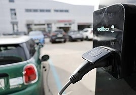 An electric car being recharged.