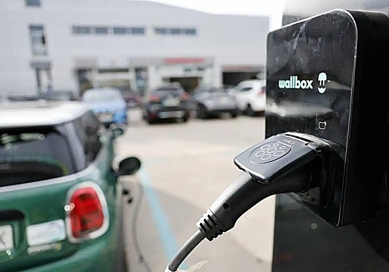 An electric car being recharged.
