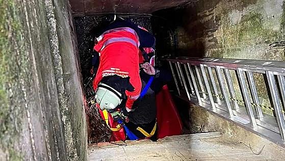 Unlucky driver suffers an accident, escapes from vehicle through window and then plunges five metres into a roadside storm drain