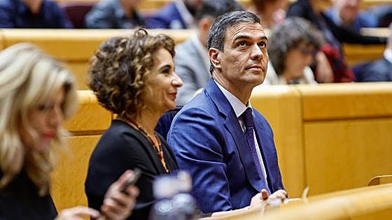 Spanish government saves votes at 11th hour with support of Catalan nationalist party