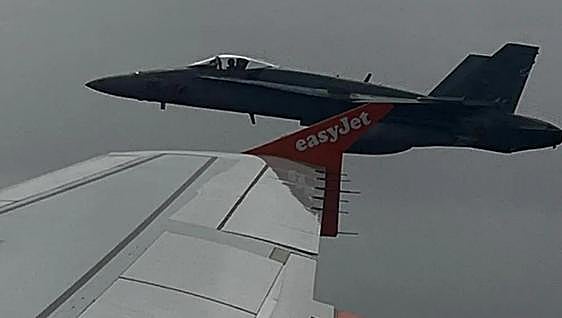 British youth faces 100,000-euro bill for bomb threat 'joke' that prompted Spain to scramble a fighter plane to escort easyJet flight