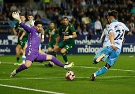 Dani Lorenzo is thwarted by former Malaga keeper Gonzalo.