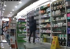 A CCTV image captured the suspect in a pharmacy in Torre del Mar.