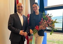 Santos with Faith Torres.