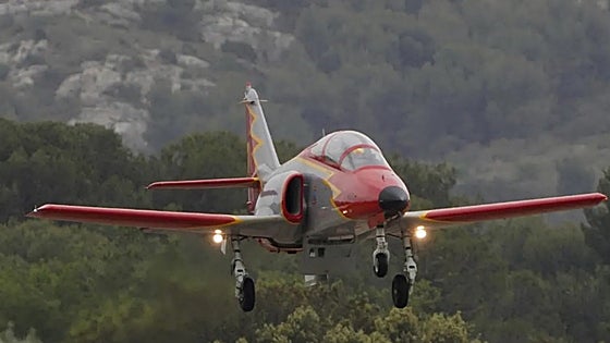 Why does a Malaga town want to put a Spanish air force aerobatic display team jet on one of its roundabouts?