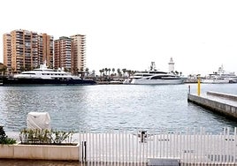The megayachts Limitless, Lady Moura and I Dynasty, lined up in the marina.