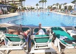 Hotels will be able to fill their swimming pools this summer (file image).