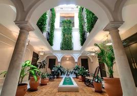 Interior courtyard of the Hotel Gravina51, located in a palatial house in Seville.