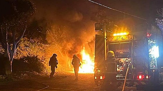 Charred body with a knife in its chest is found after camper van blaze on the Costa del Sol