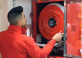 An Incotex technician checks a fire fighting installation.