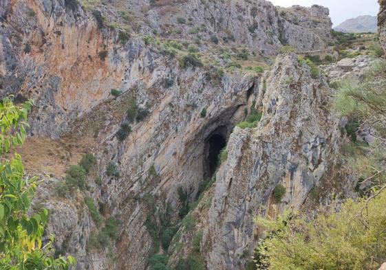 The Hundidero cave mouth from a nearby viewpoint (for scale note the roadway running just above it).