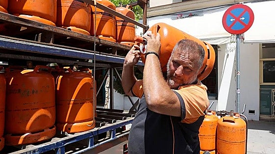 What will happen in July when the government ends the price cap on bottled butane gas in Spain?