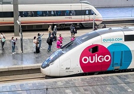 An Ouigo train and a Renfe train at Zaragoza station.