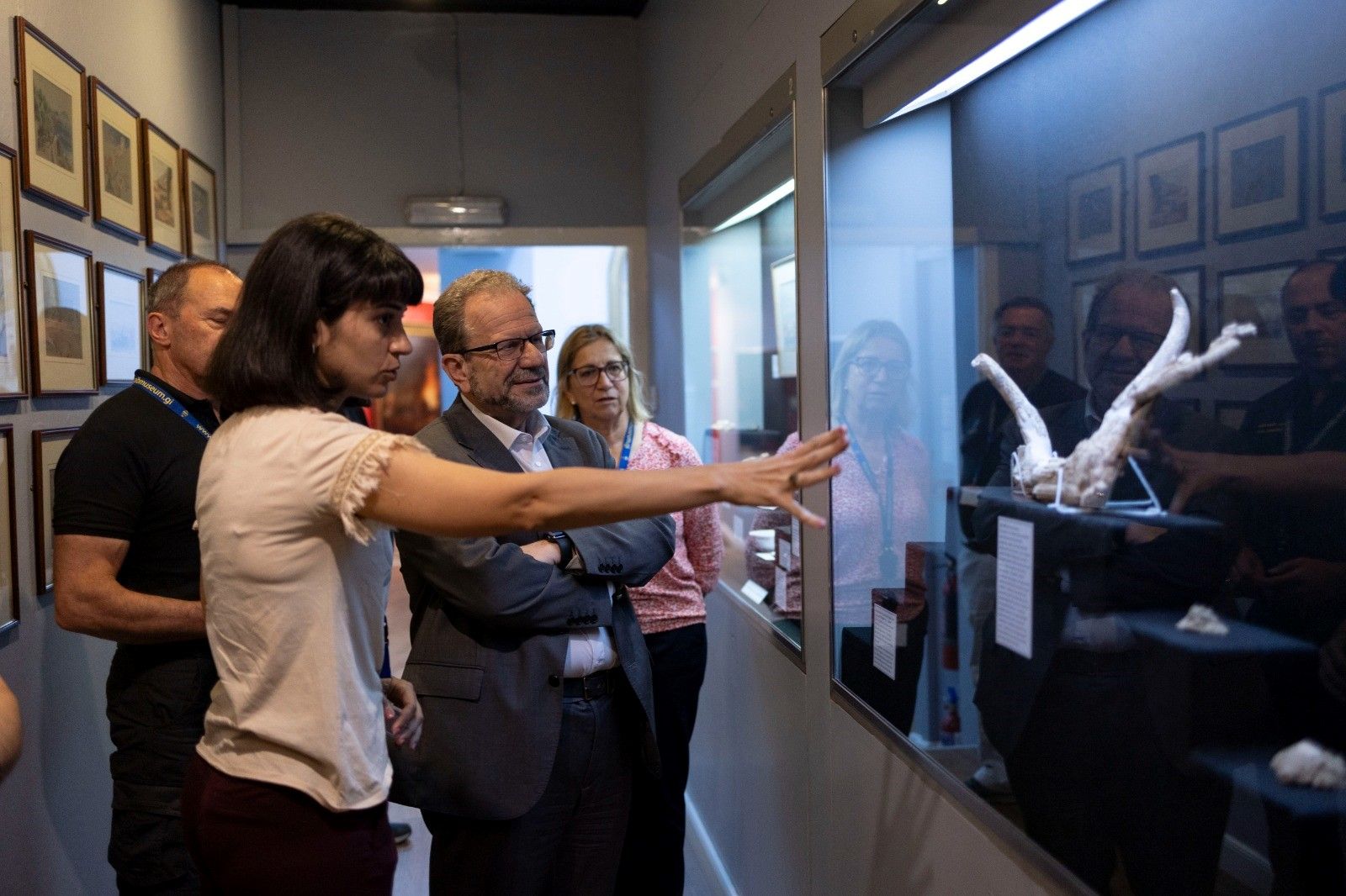 Minister for Heritage John Cortes views the restored antler of a red deer, excavated from the Neanderthals' Grotto last summer.