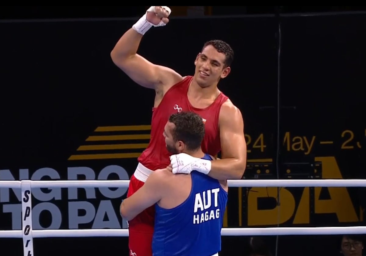 Ghadfa lifted aloft as he celebrates qualification.