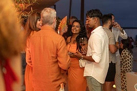 Attendees complied with the orange dress code.