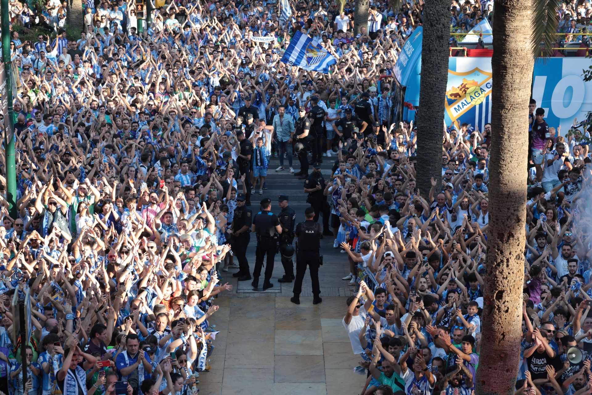 Fans celebrate Malaga CF's promotion as squad take open-top bus tour, in images