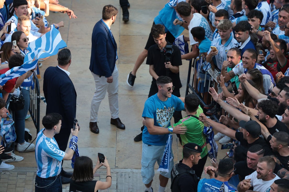 Fans celebrate Malaga CF's promotion as squad take open-top bus tour, in images