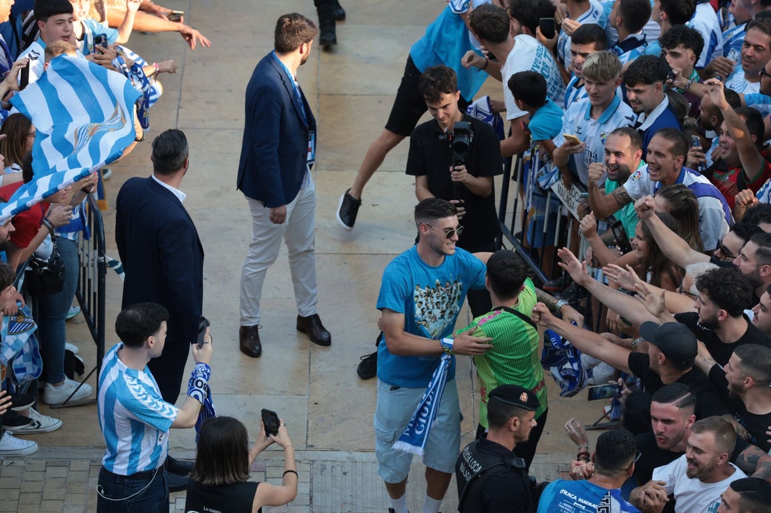 Fans celebrate Malaga CF's promotion as squad take open-top bus tour, in images