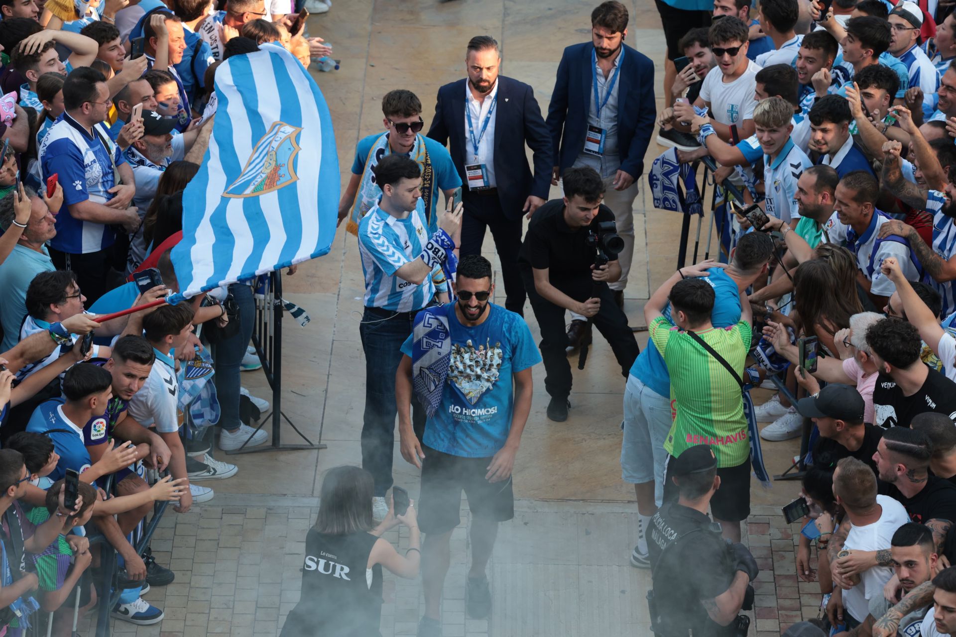 Fans celebrate Malaga CF's promotion as squad take open-top bus tour, in images