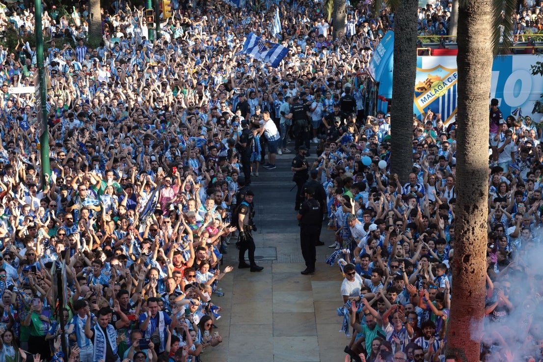 Fans celebrate Malaga CF's promotion as squad take open-top bus tour, in images
