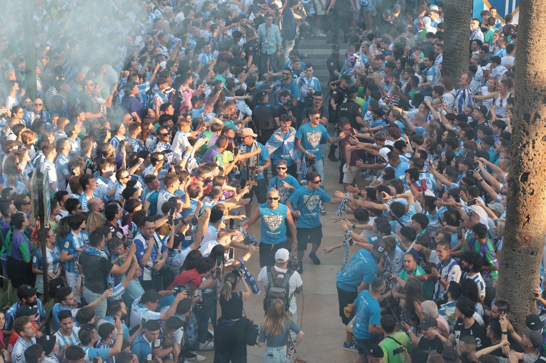 Fans celebrate Malaga CF's promotion as squad take open-top bus tour, in images