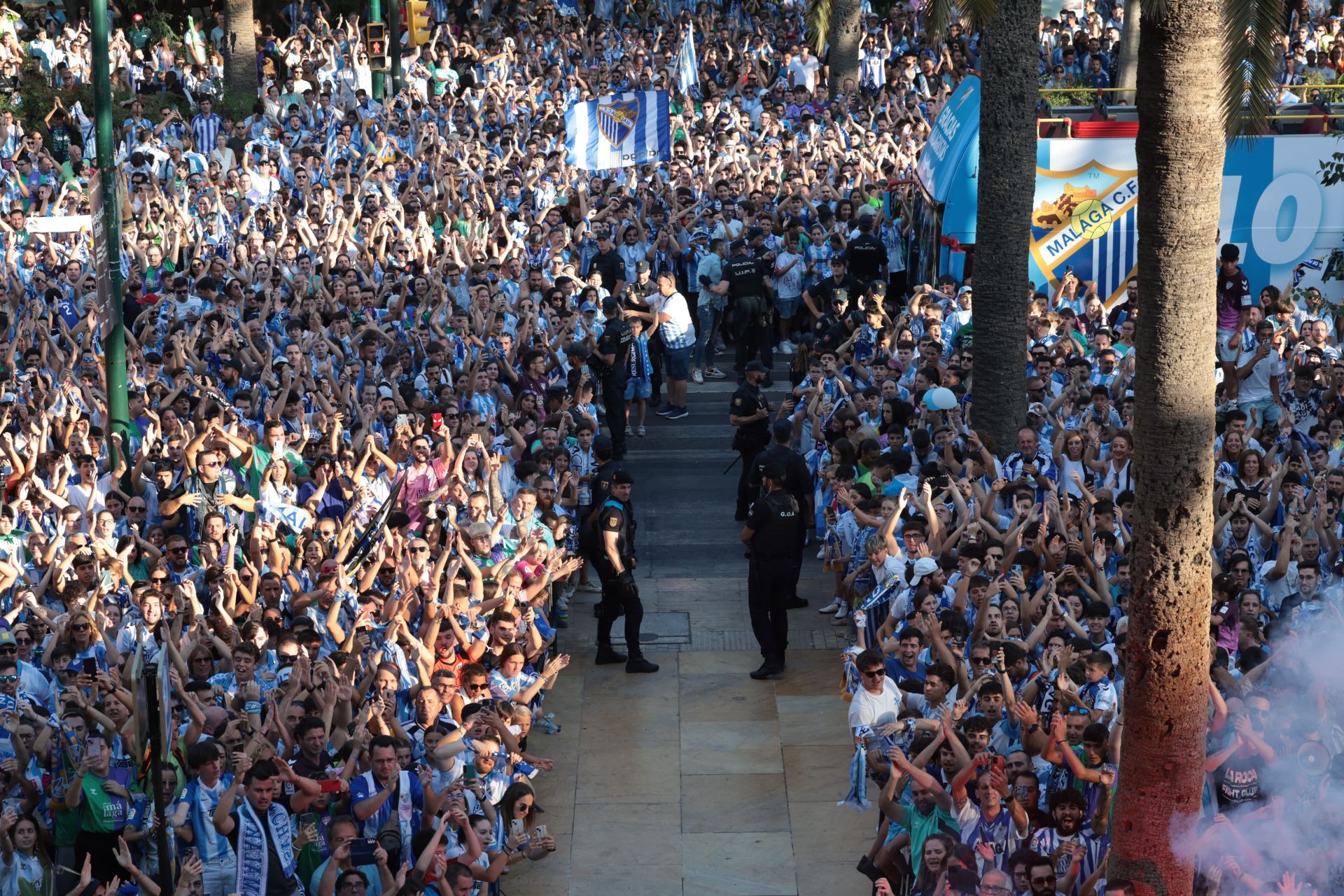 Fans celebrate Malaga CF's promotion as squad take open-top bus tour, in images