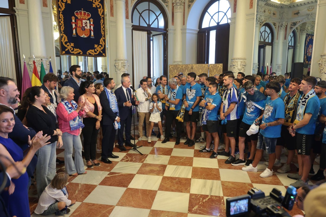 Fans celebrate Malaga CF's promotion as squad take open-top bus tour, in images