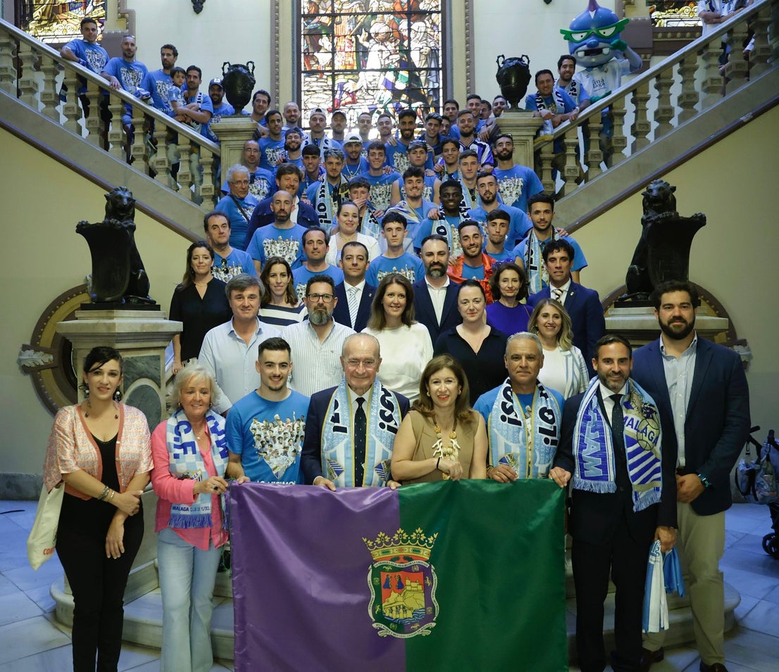 Fans celebrate Malaga CF's promotion as squad take open-top bus tour, in images