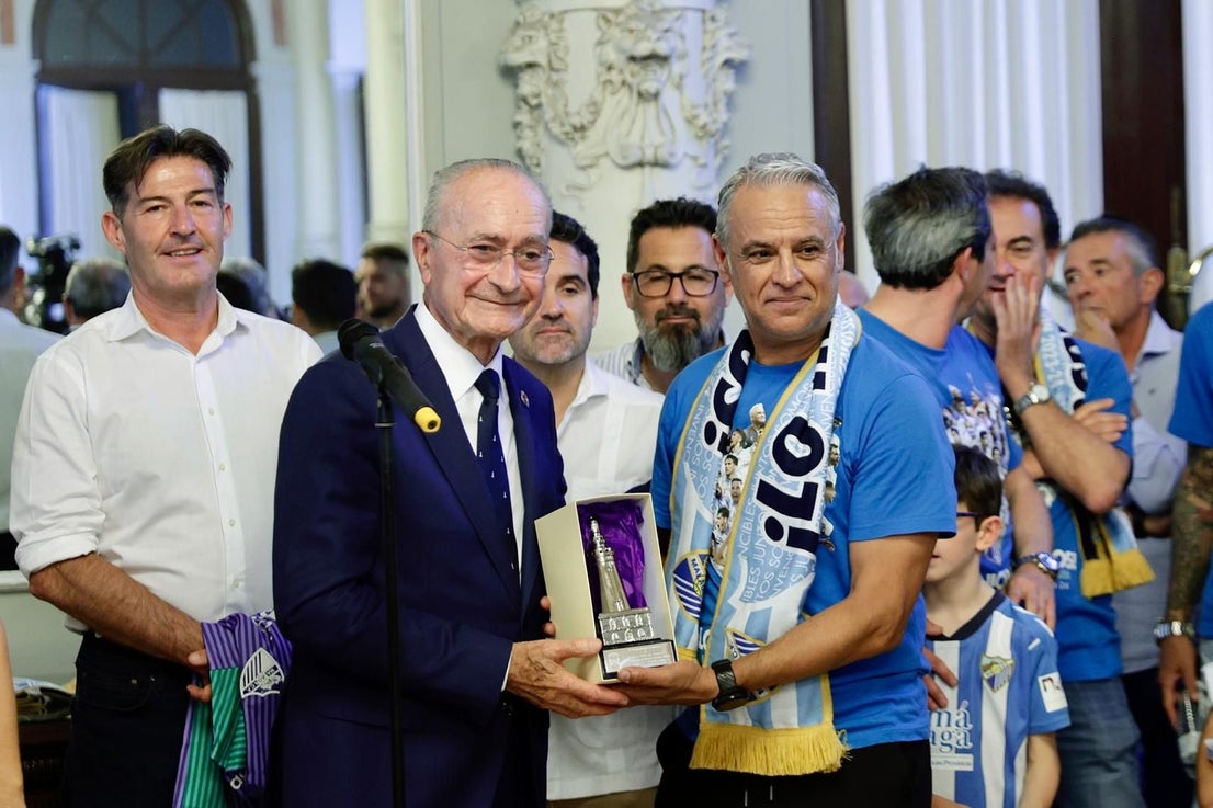 Fans celebrate Malaga CF's promotion as squad take open-top bus tour, in images