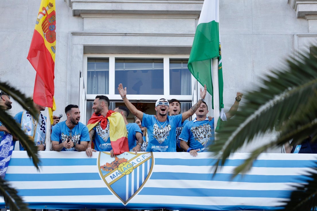 Fans celebrate Malaga CF's promotion as squad take open-top bus tour, in images