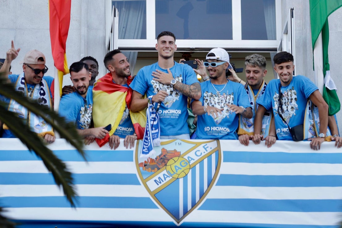 Fans celebrate Malaga CF's promotion as squad take open-top bus tour, in images