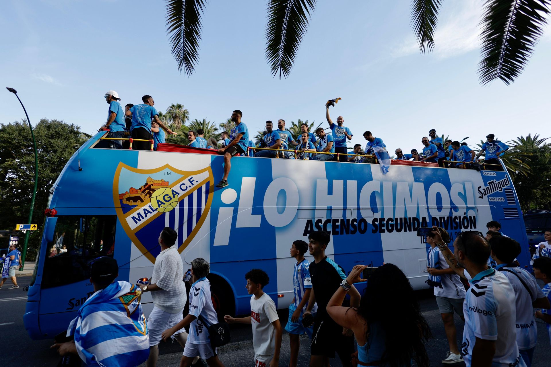 Fans celebrate Malaga CF's promotion as squad take open-top bus tour, in images