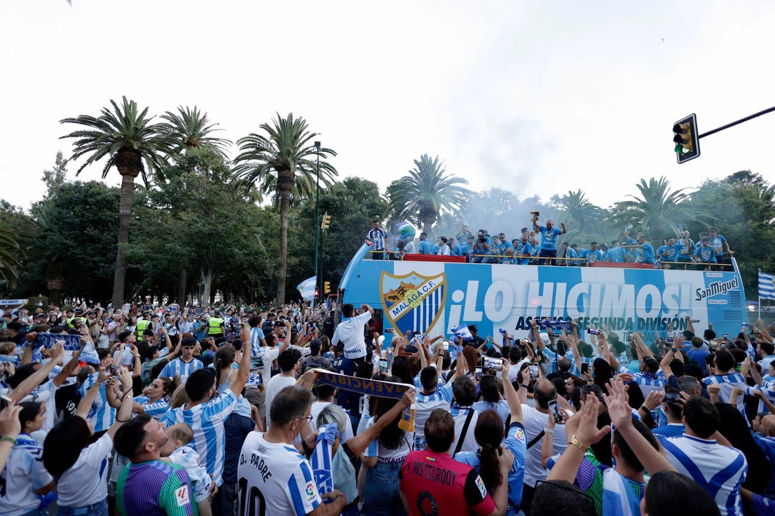 Fans celebrate Malaga CF's promotion as squad take open-top bus tour, in images
