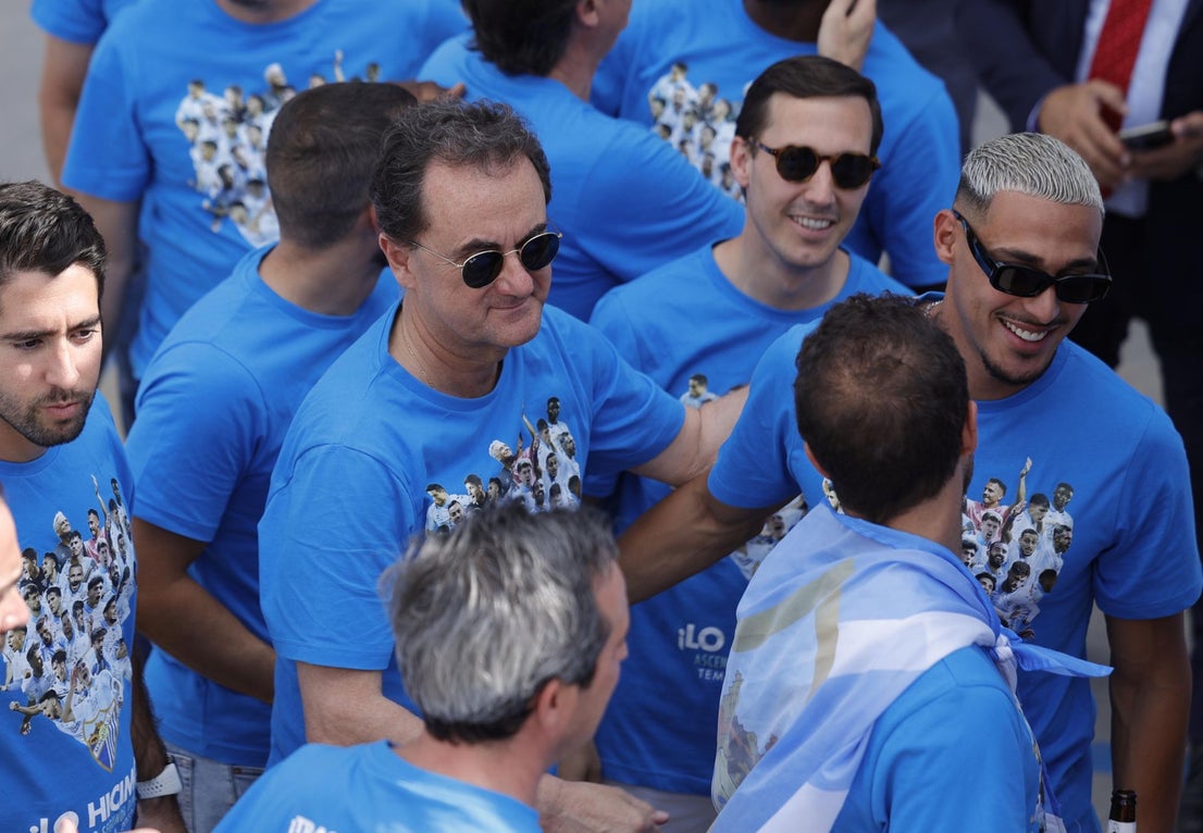 Fans celebrate Malaga CF's promotion as squad take open-top bus tour, in images
