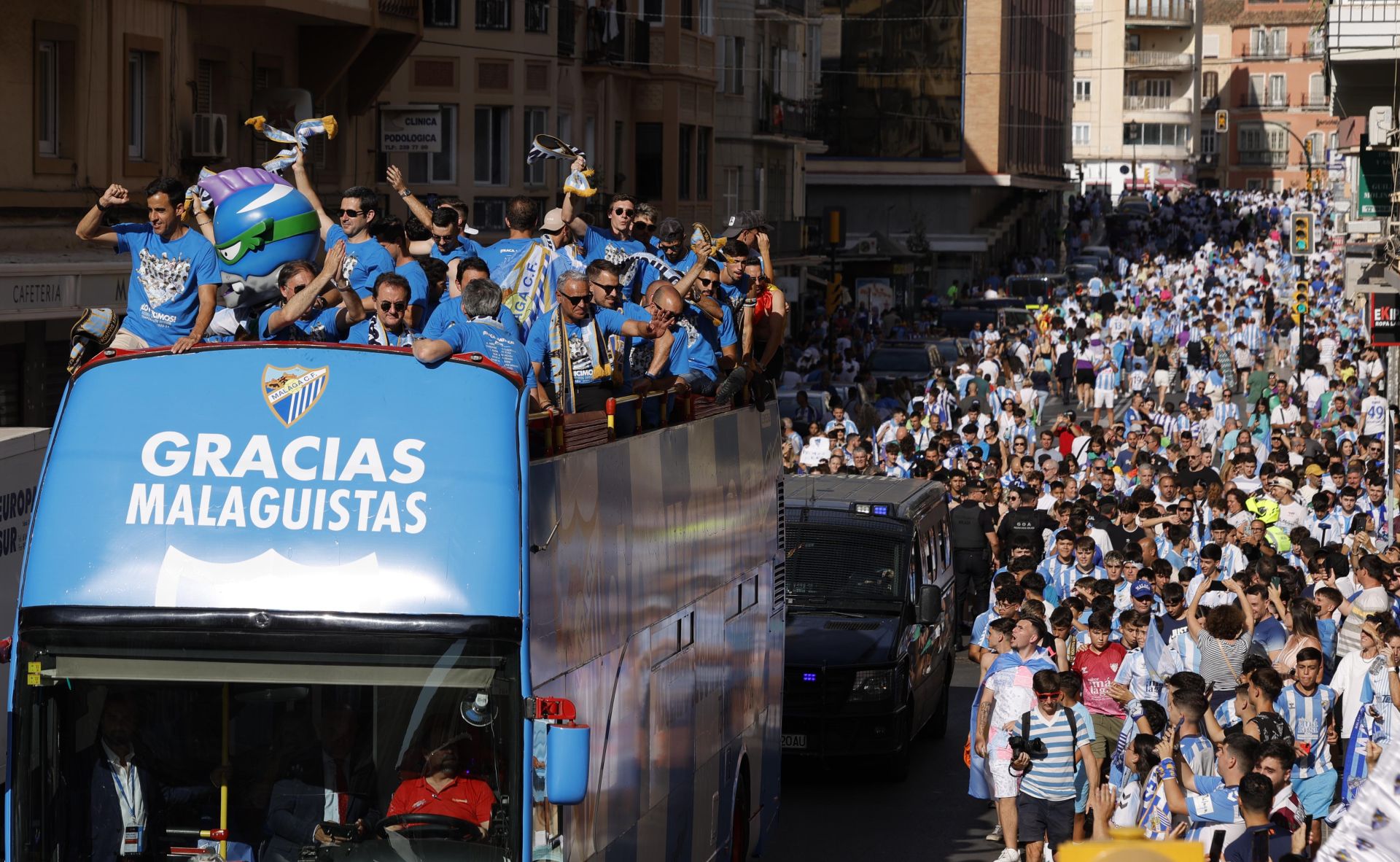 Fans celebrate Malaga CF's promotion as squad take open-top bus tour, in images