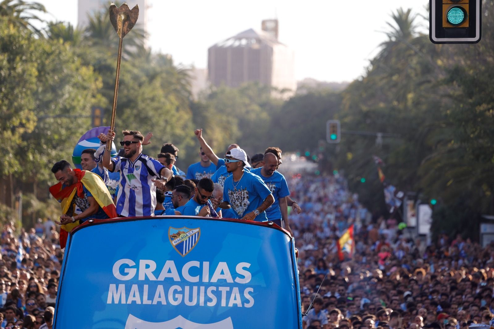 Fans celebrate Malaga CF's promotion as squad take open-top bus tour, in images