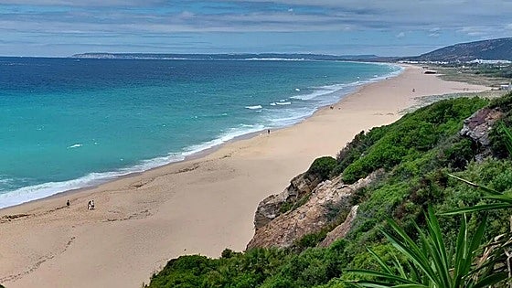 Why has bathing been banned on a section of a popular Costa de la Luz beach?