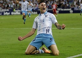 Roberto celebrates one of his 20 goals for Malaga last season.
