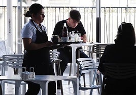 Archive image of waiting staff hard at work.