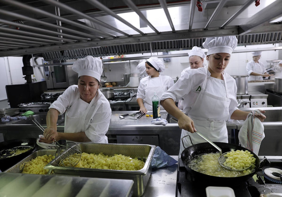 Alumnae of La Cónsula, a hotel and catering school with a 100% job placement rate